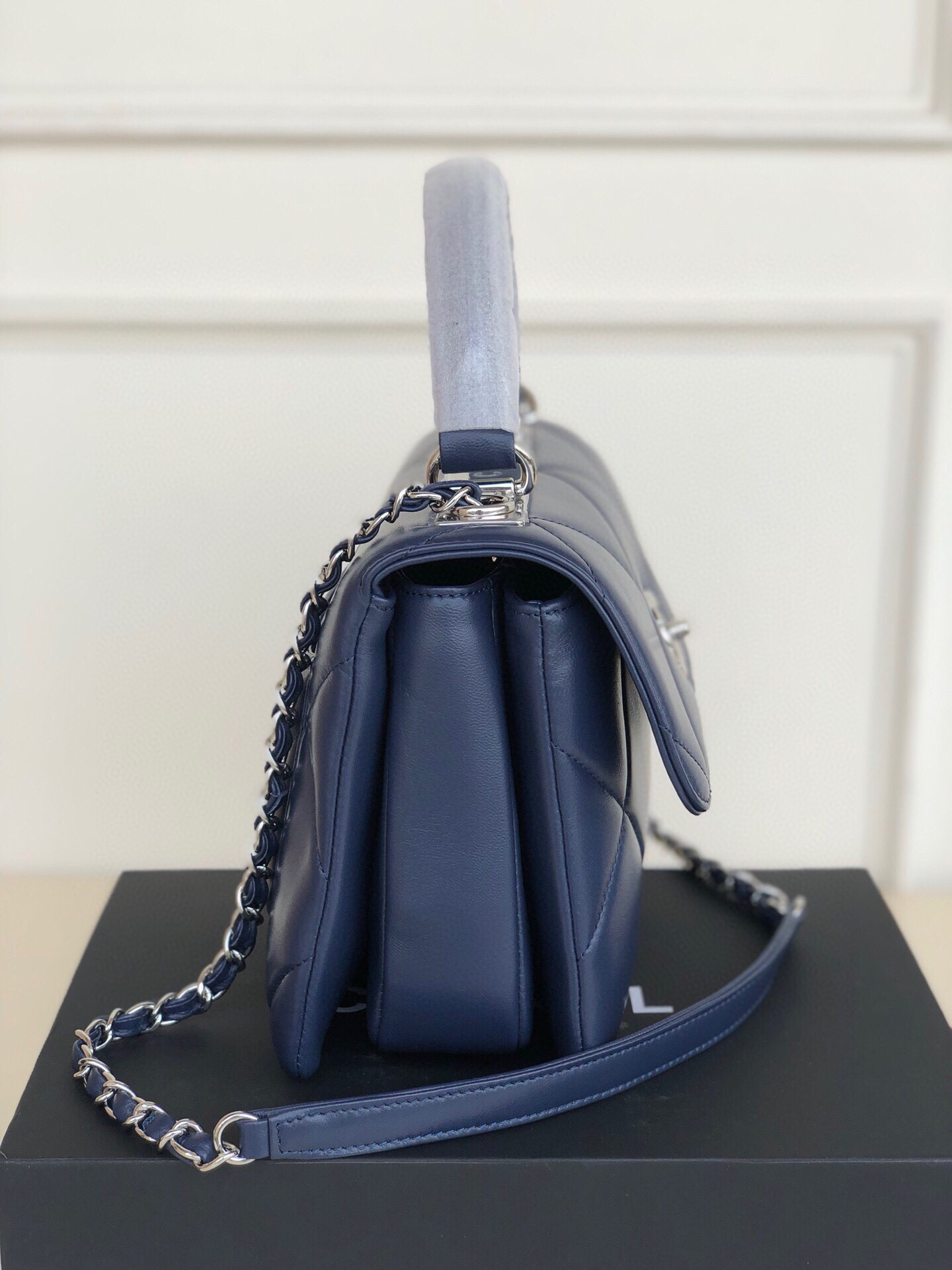 Ch*el flap bag with top handle 6.6 × 9.8 × 4.7 in