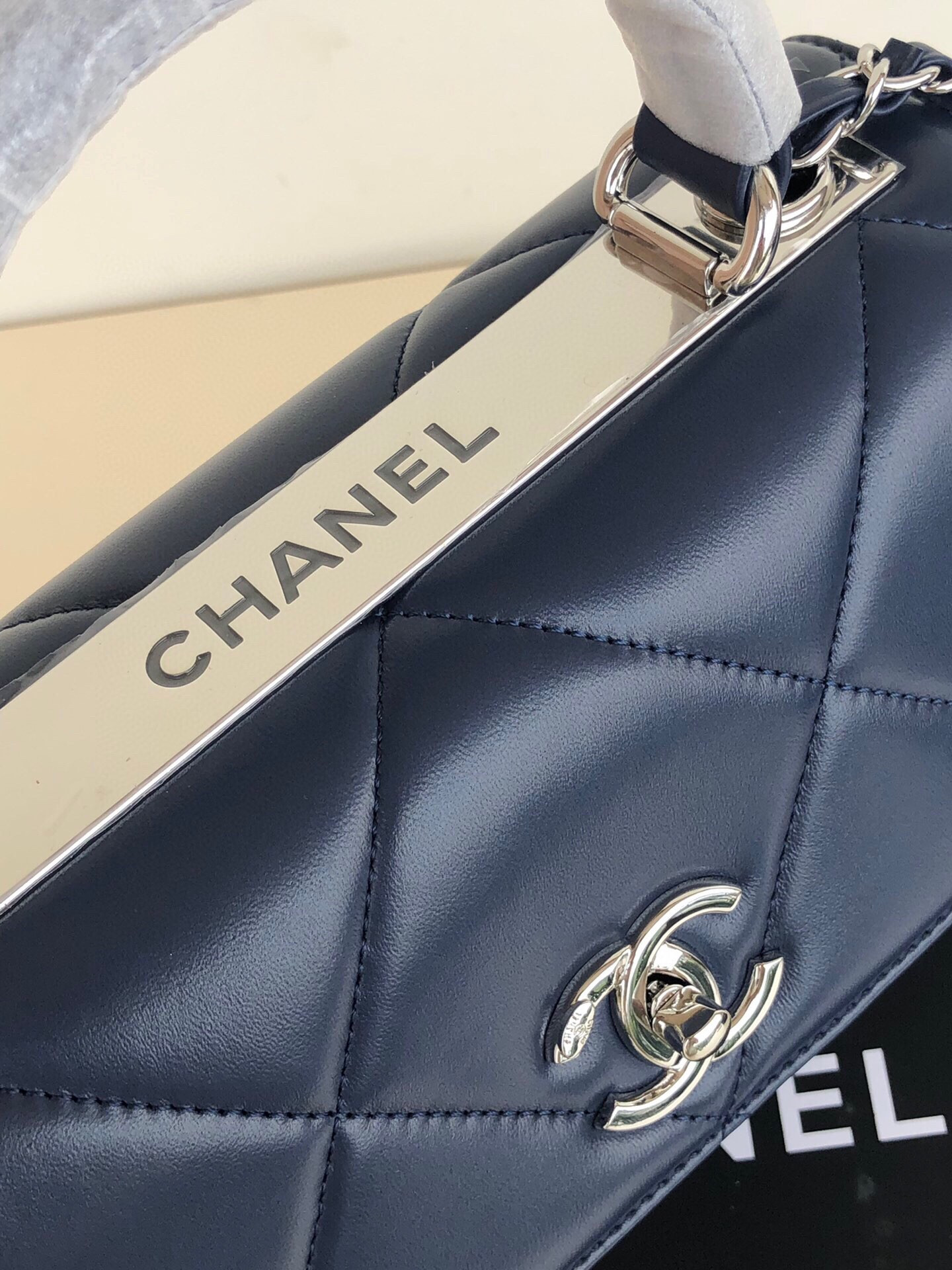 Ch*el flap bag with top handle 6.6 × 9.8 × 4.7 in