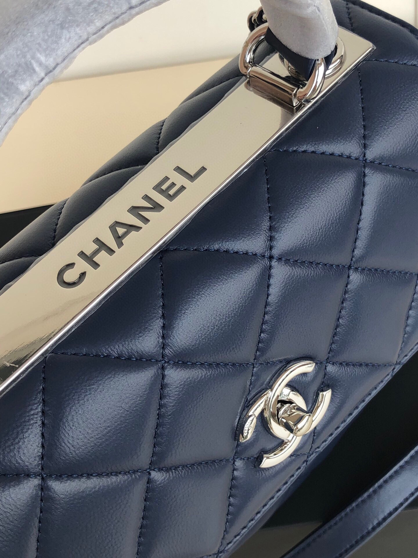 Ch*el flap bag with top handle 6.6 × 9.8 × 4.7 in