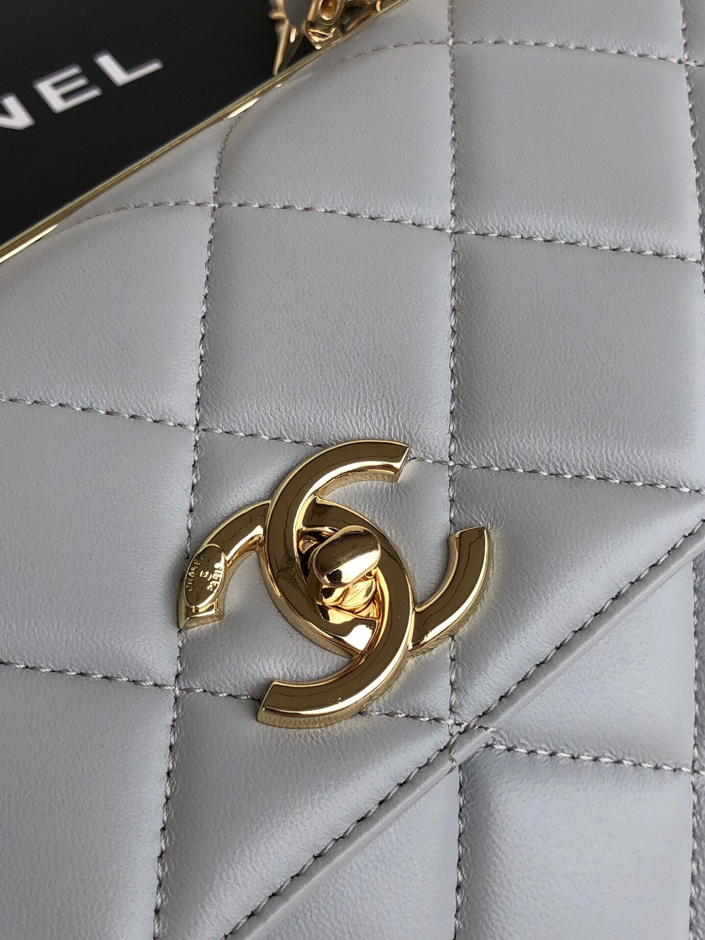 Ch*el flap bag with top handle 6.6 × 9.8 × 4.7 in