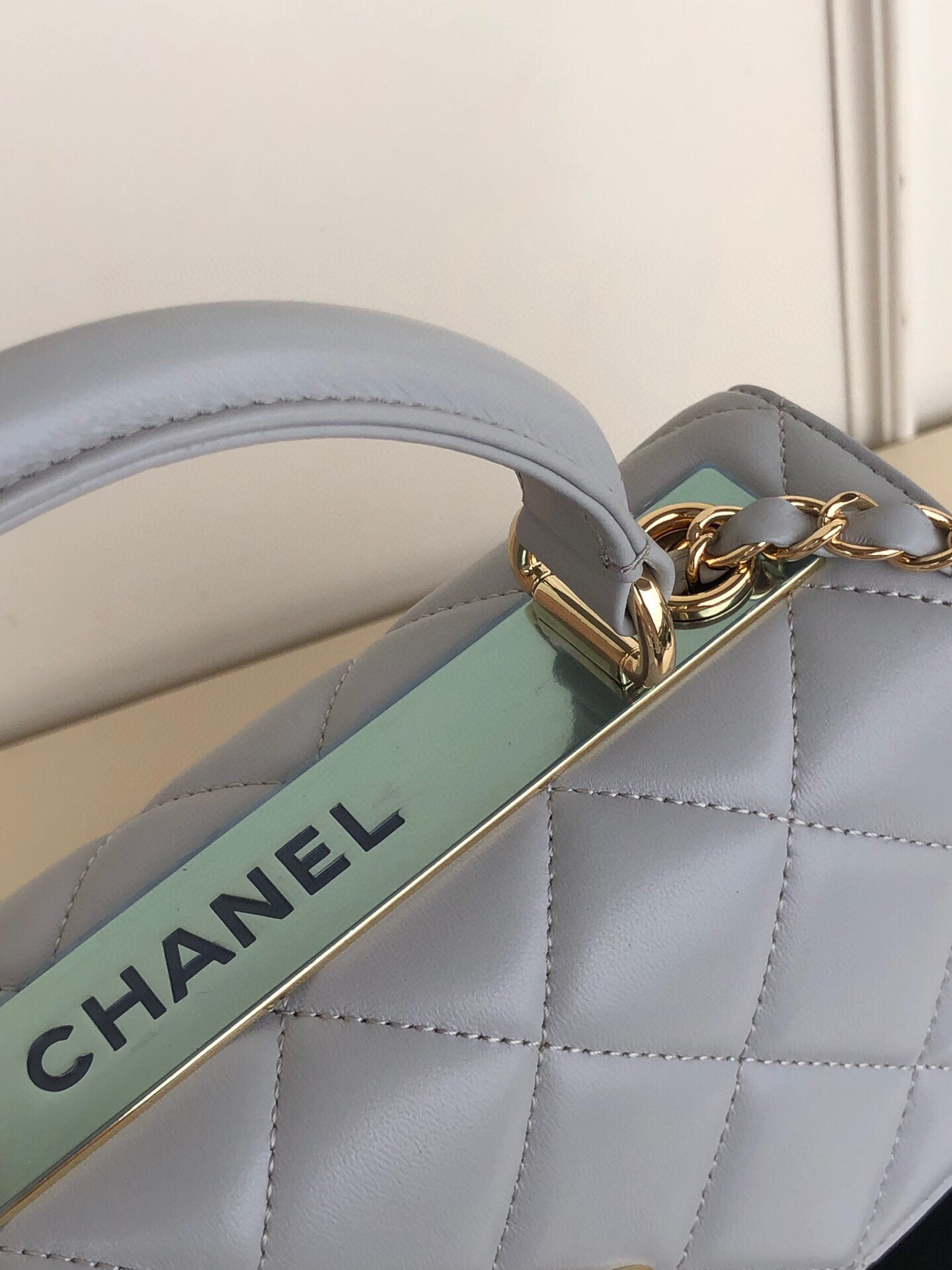 Ch*el flap bag with top handle 6.6 × 9.8 × 4.7 in