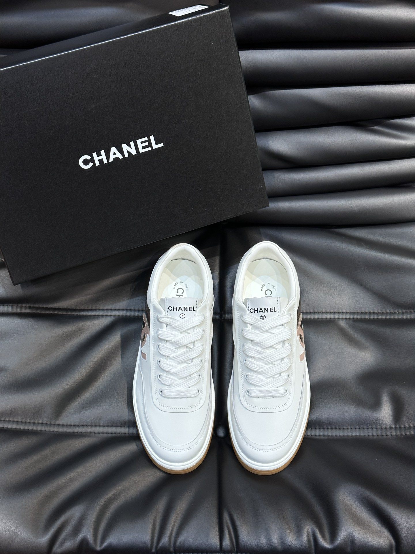 ua Ch*el sneaker calfskin
