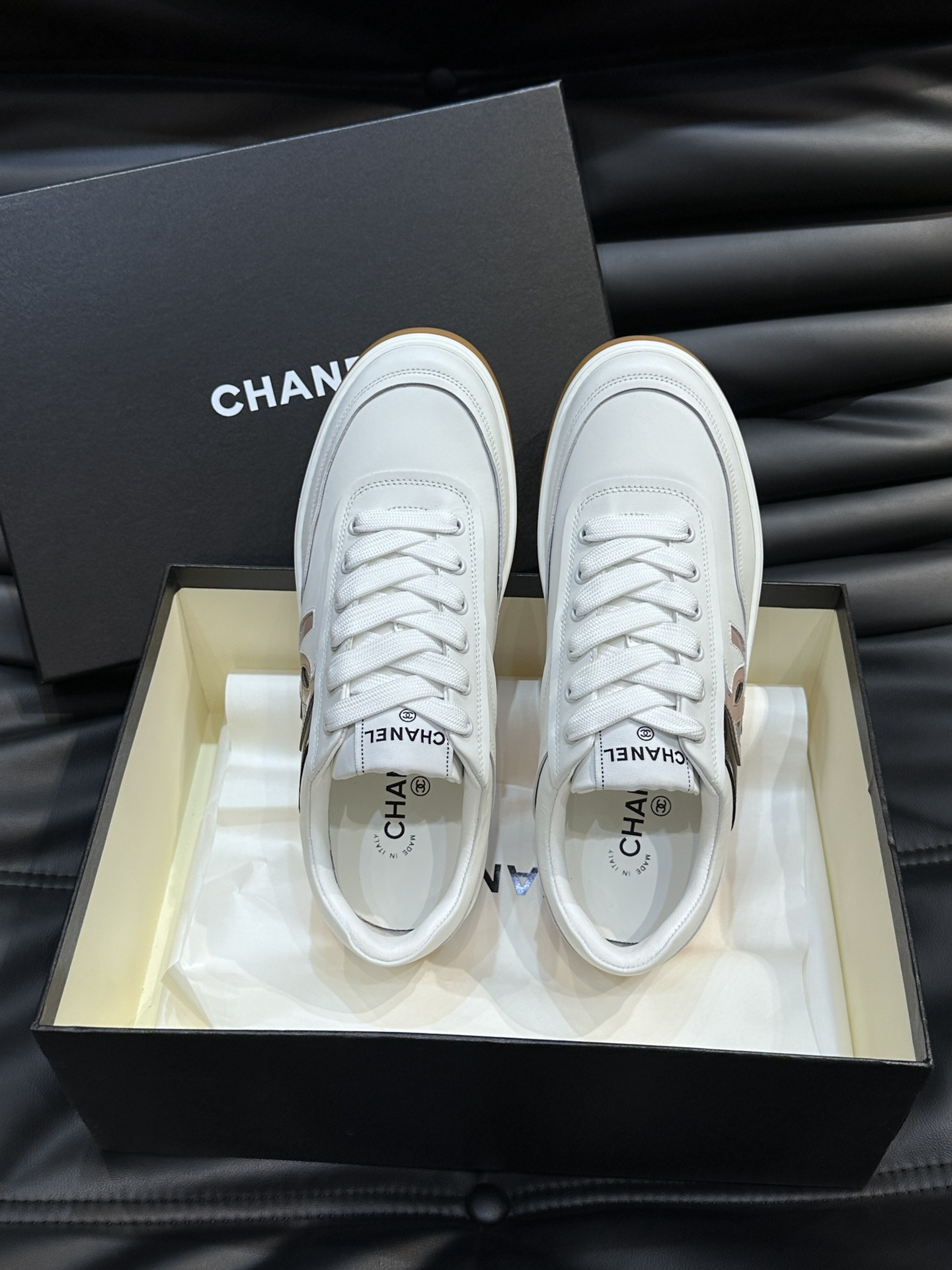 ua Ch*el sneaker calfskin