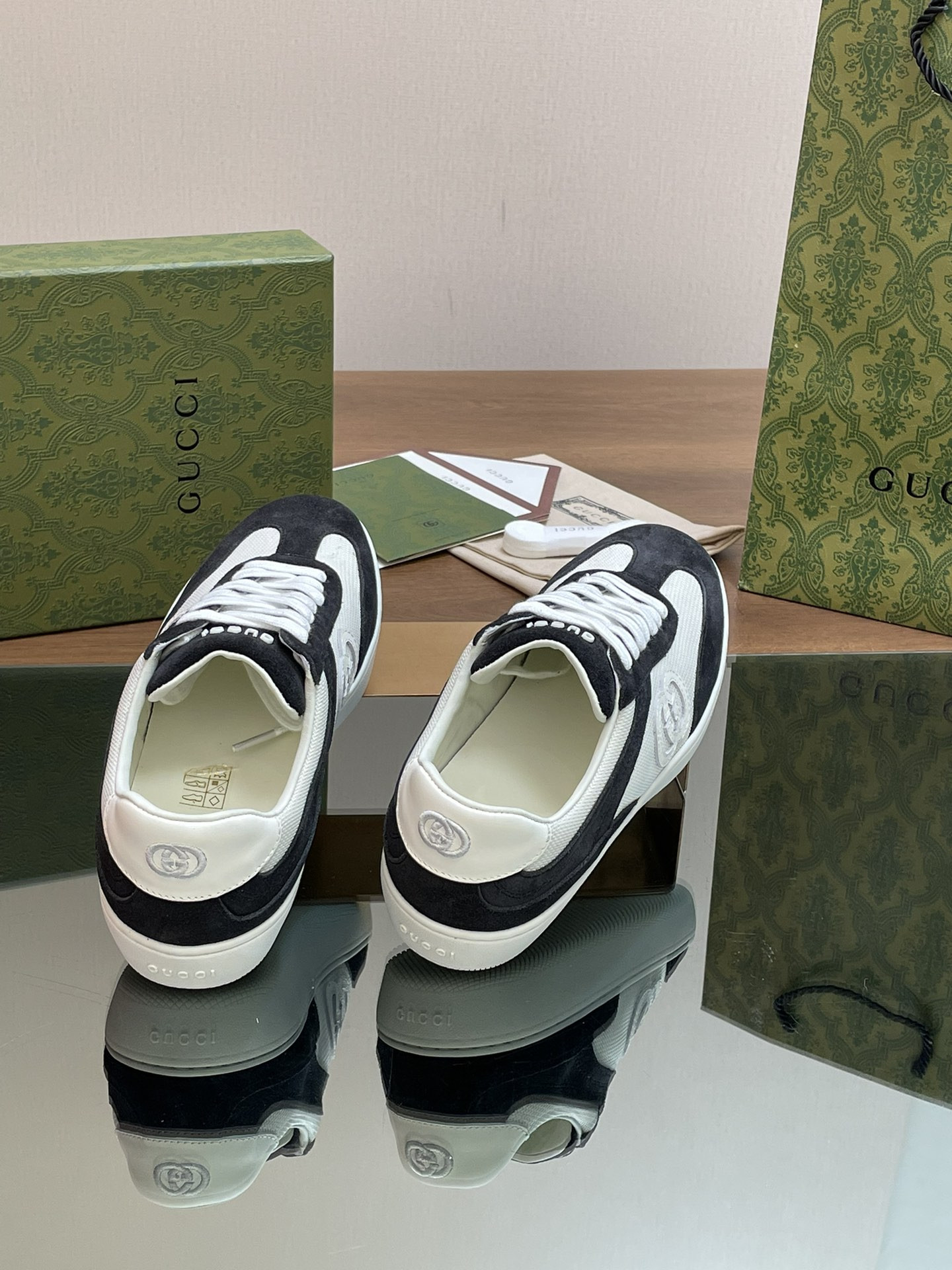 ua G*u*i interlocking g sneaker black and white