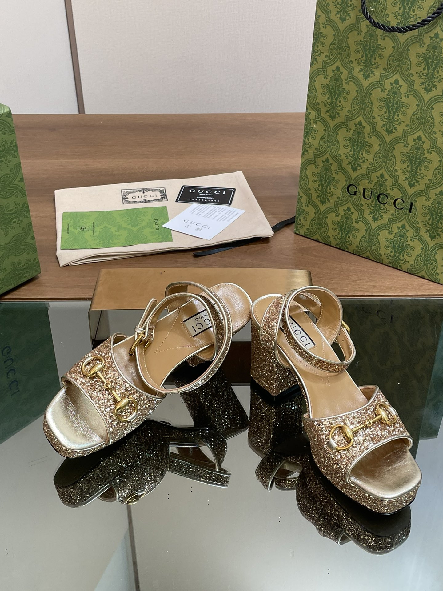 ua G*u*i horsebit platform sandal