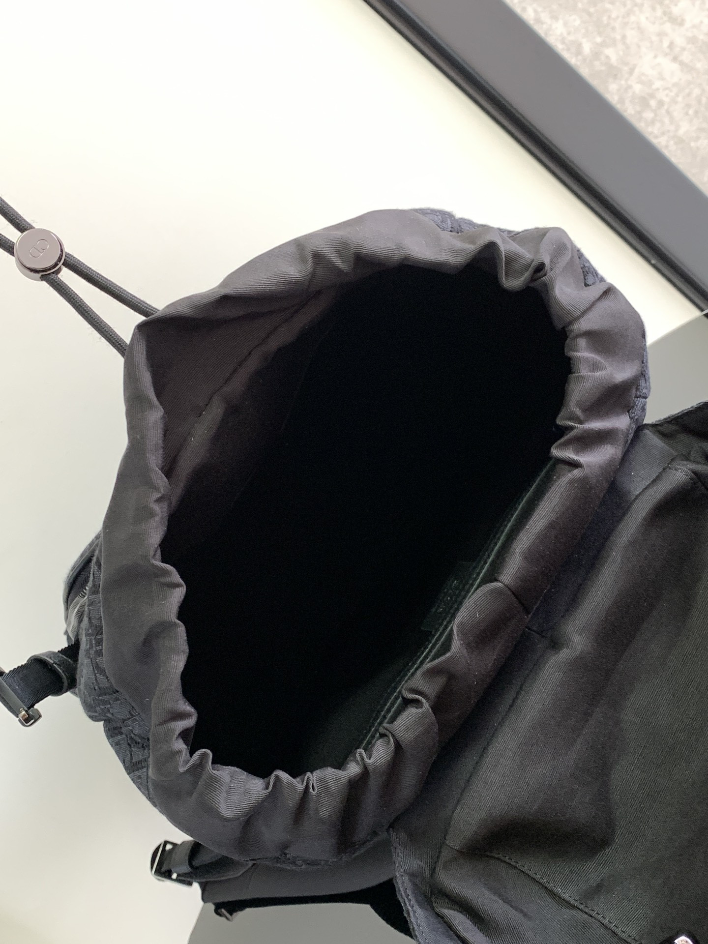 D*or 8 backpack with flap black D*or oblique jacquard 31 x 48 x 16.5 cm