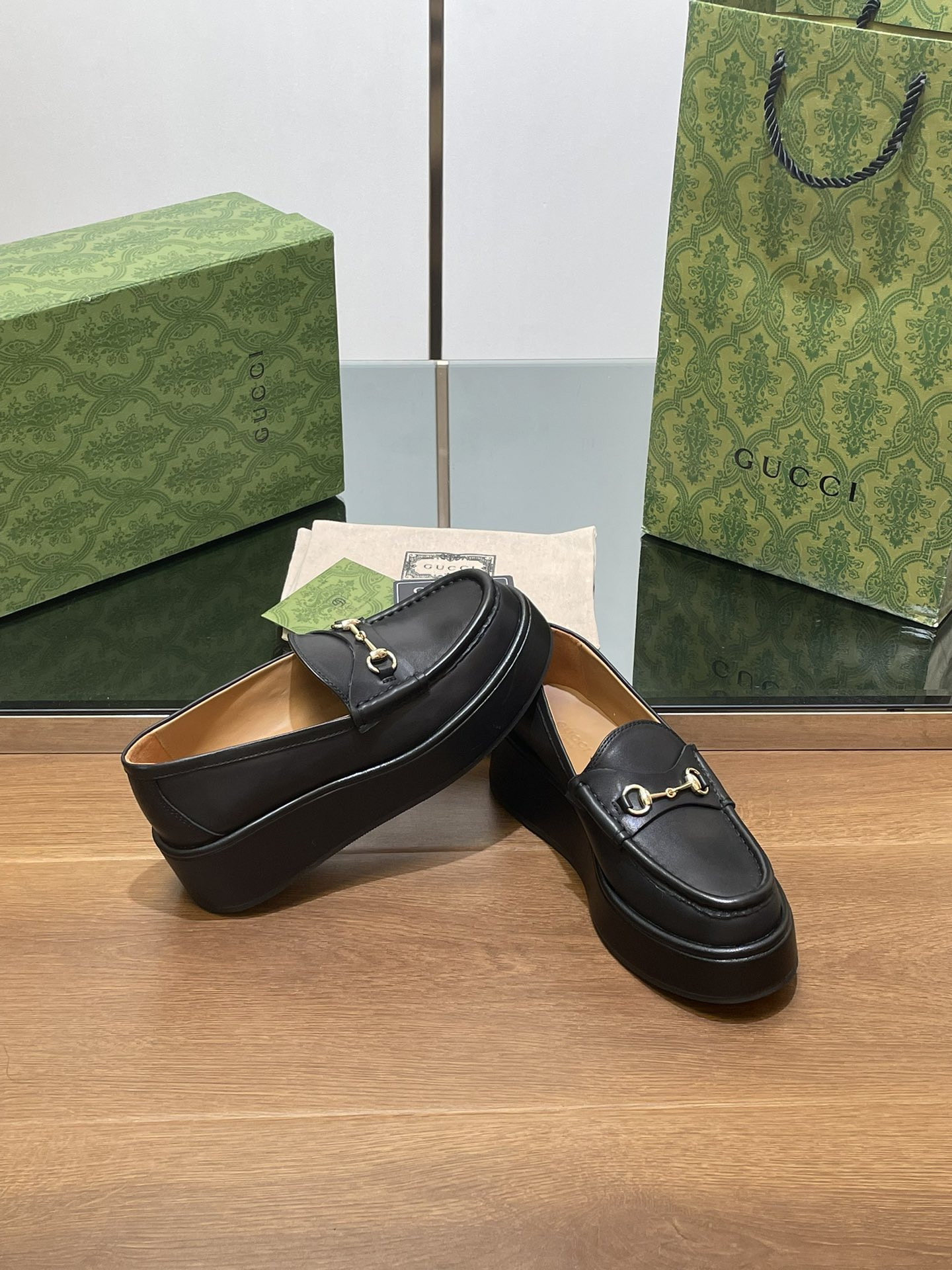 ua G*u*i horsebit wedge loafer