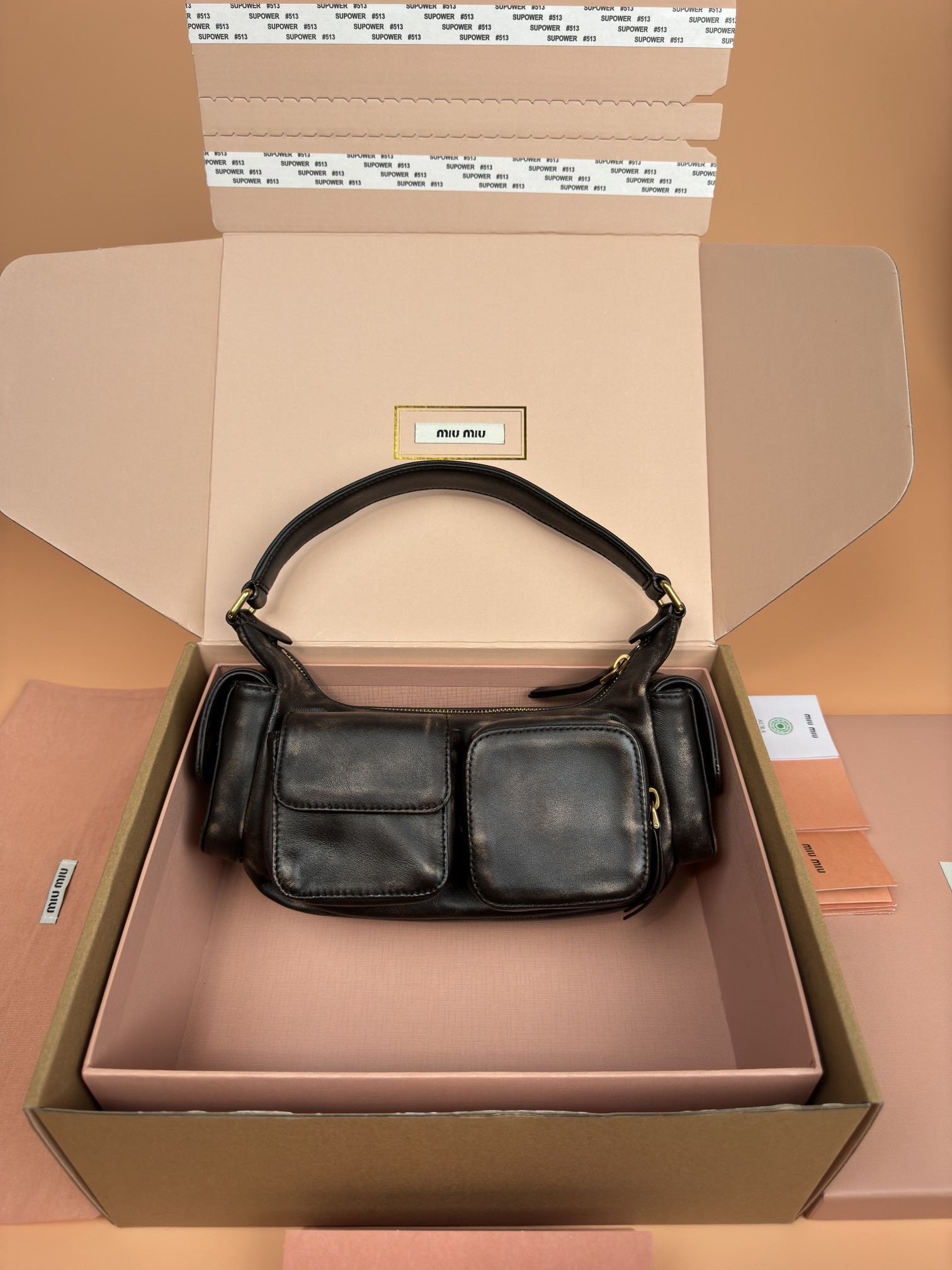 Miu Miu Hobo Nappa leather pocket bag 12x21x6cm