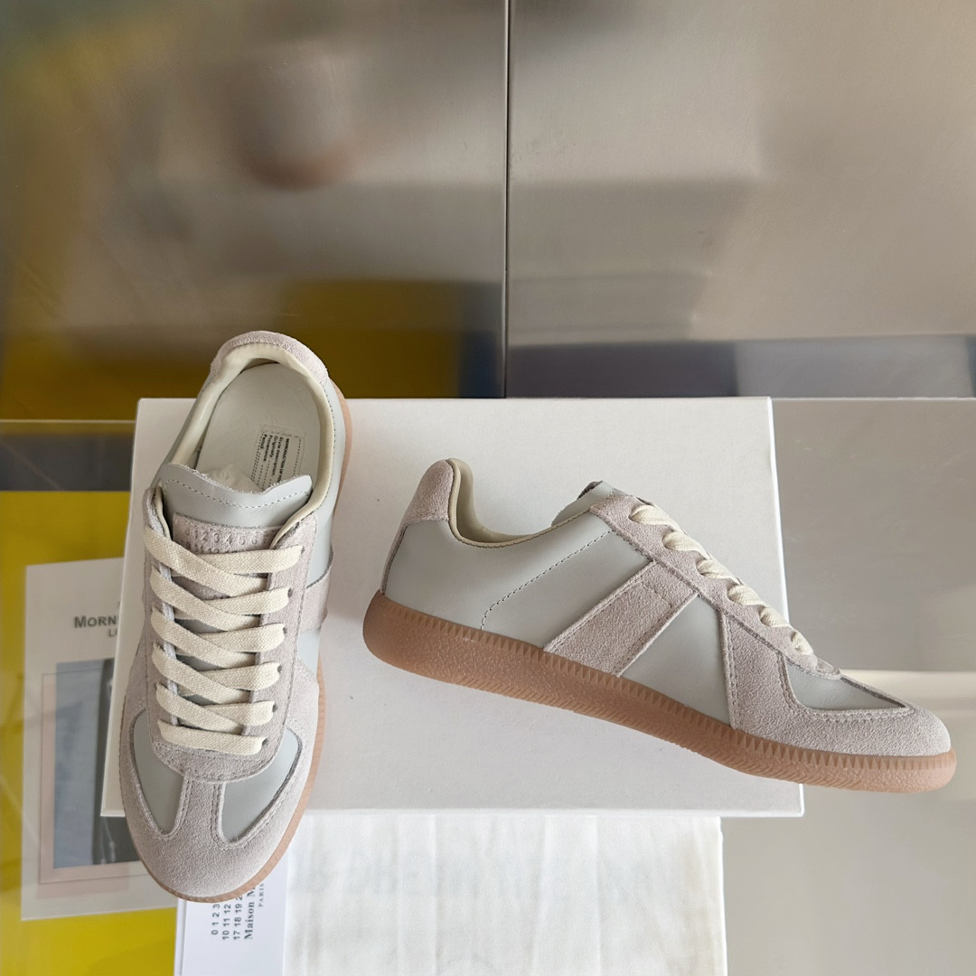 ua ma*s*n Ma*i*la mm6 sneakers