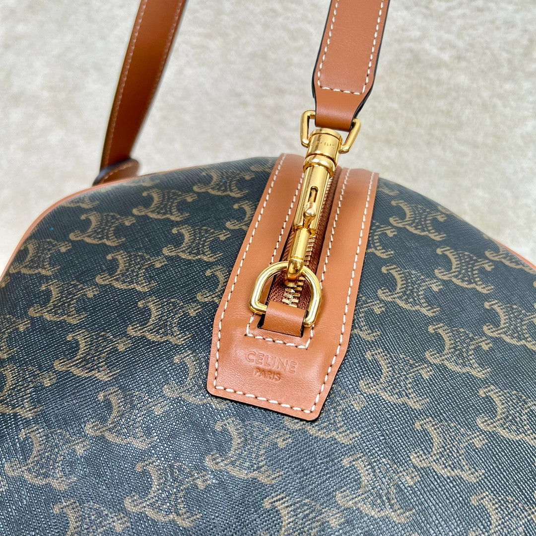 Ce**e large travel bag in triomphe canvas with Ce**e print 50x27x23cm