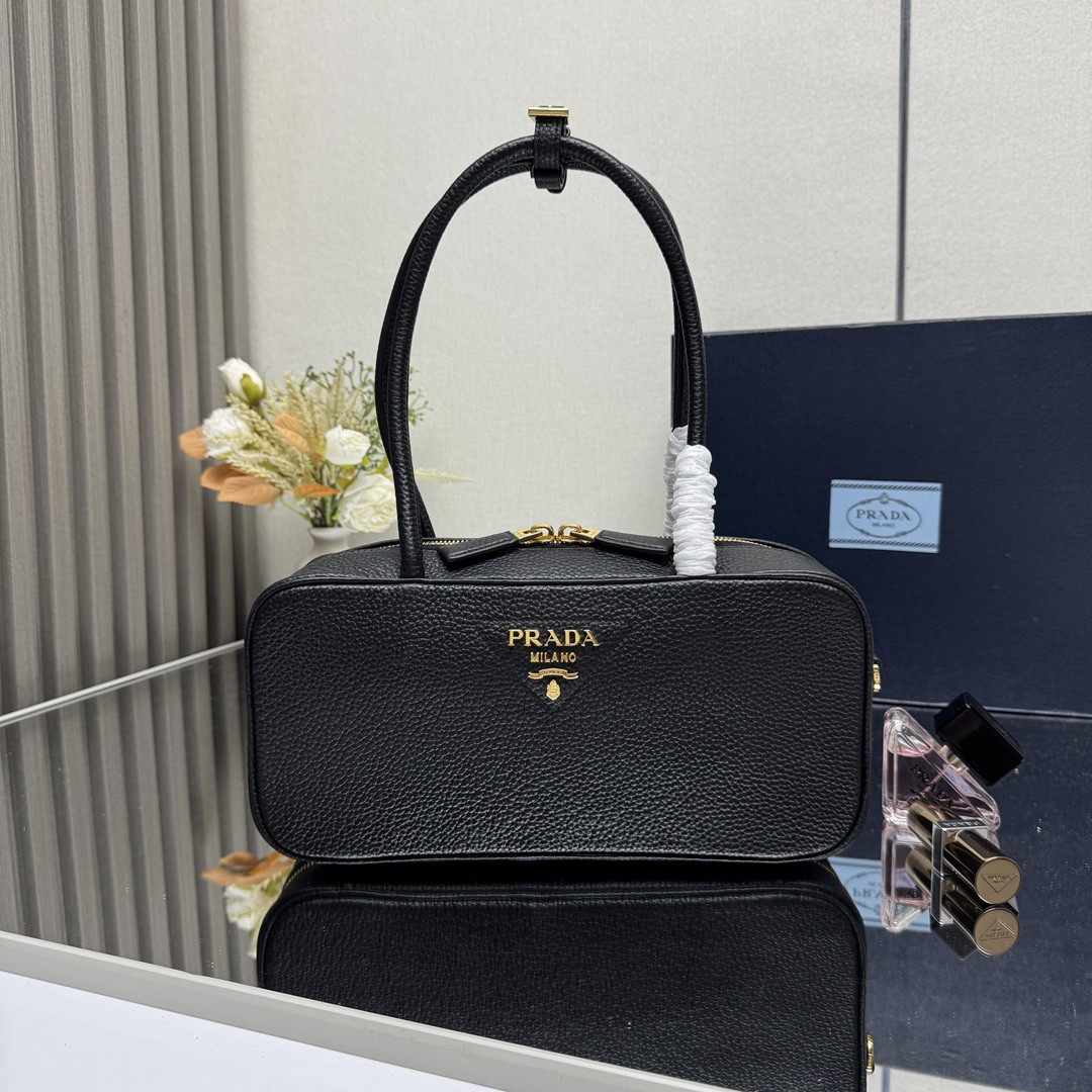 Pra*a medium top handle bag in vitello dino soft leather 13x28x8cm