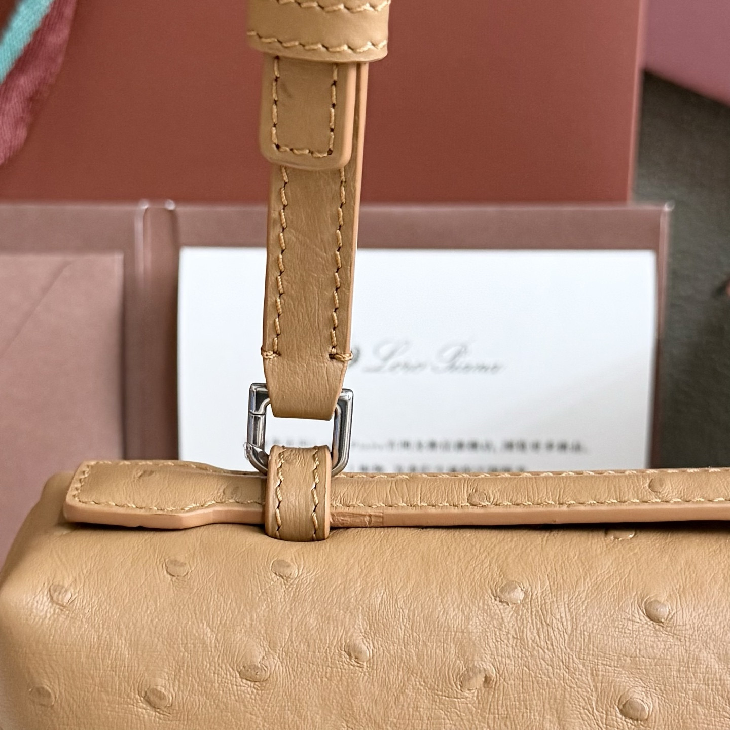 L**o p*ana extra pocket l27 ostrich-grained leather 16x27x10cm